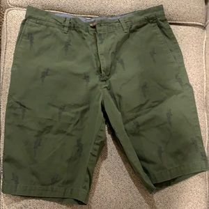 Men’s shorts- olive green with navy parrots